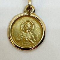 Encontré medalla sagrado Corazón de Jesús